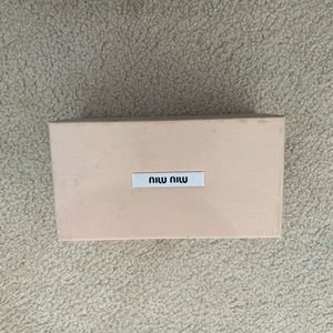 Blush pink Miu Miu box